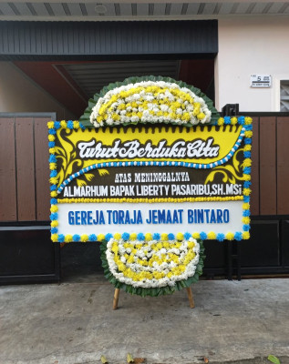Papan Bunga Duka di Pebatuan